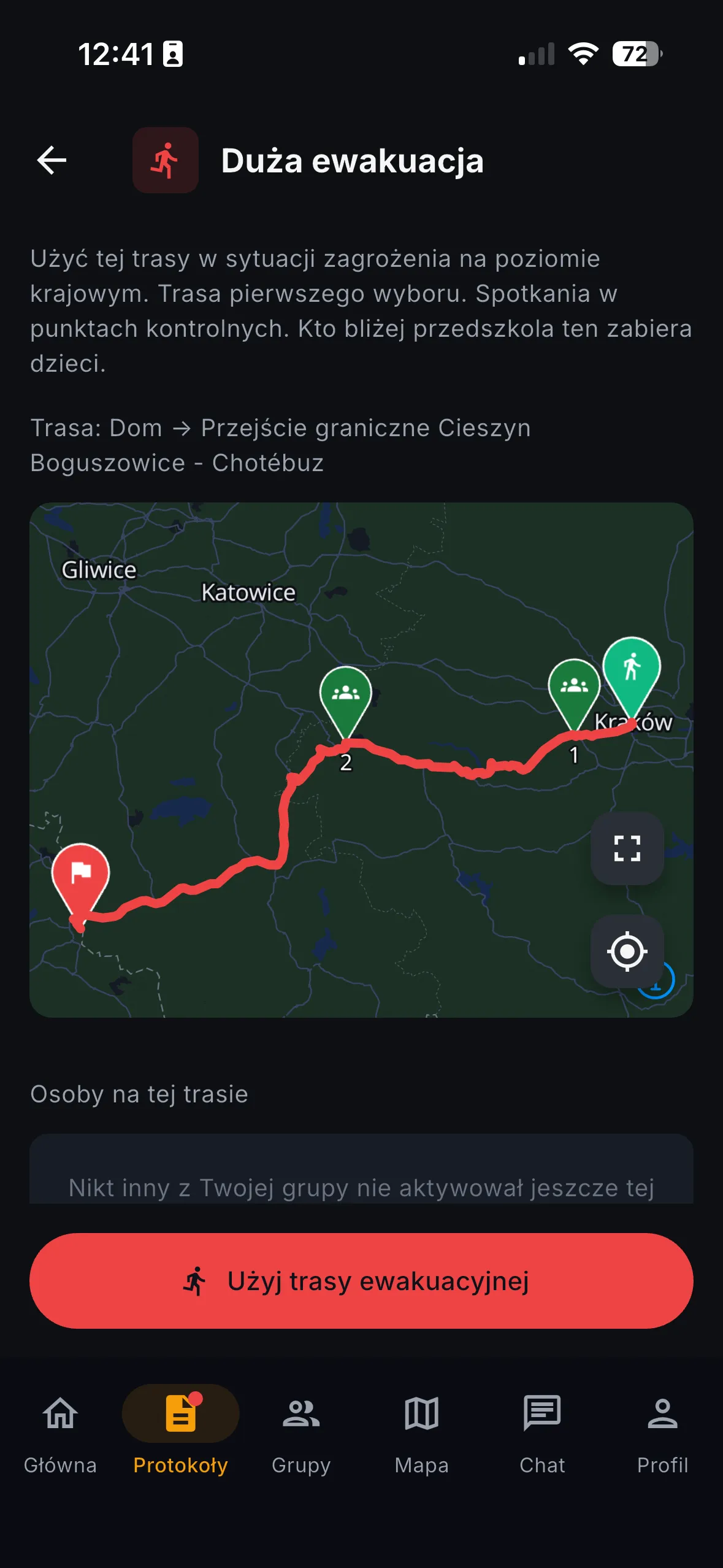 Ekran trasy Duża ewakuacja z mapą przebiegu trasy z Krakowa do przejścia granicznego, punktami zbiórki i przyciskiem Użyj trasy ewakuacyjnej.